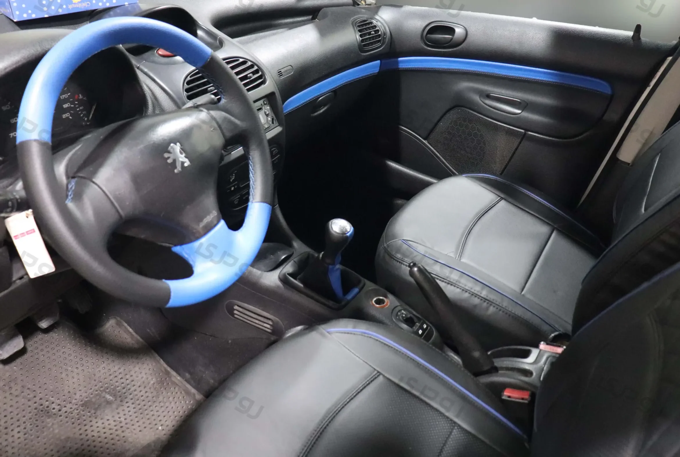 رودری پژو 206 آبی/ مشکی